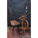 A Country Cottage spinning wheel;