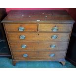 A George III oak chest of two short over three long graduated drawers,