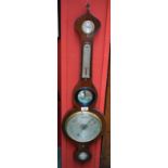 A William IV rosewood onion top wheel barometer, 19cm silvered register, alcohol thermometer,