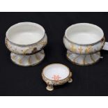 A pair of South Staffordshire enamel pedestal salts,