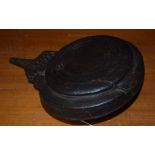 A Middle Eastern/North African leather moon shaped powder flask, pierced steel mount 21.