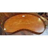 An Edwardian mahogany kidney shaped serving tray, shallow alternating gallery,