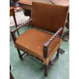 A late 19th century Spanish style open armchair, rectangular back,