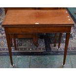 An early 20th century mahogany tea table,