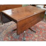 A Regency mahogany Pembroke table, rectangular top with fall leaves, ring-turned column,