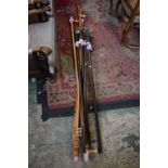 A long country house style curtain pole with loop hooks;