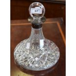 A silver mounted cut glass ship's decanter,