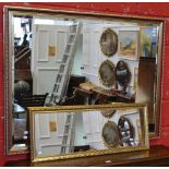 A large rectangular gilt framed wall mirror, bevelled edge, overall 99cm x 130,