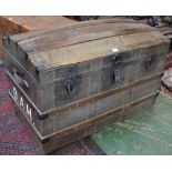 A 20th century metal mounted trunk, hinged dome cover enclosing three card lined compartments,