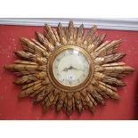 A Smiths sunburst wall clock,