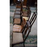 A set of three early 20th century oak side chairs, pierced arrow shaped splats; others, cane seat,