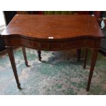 A 20th century mahogany side table, serpentine top above a pair of frieze drawers,