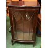 A 20th century mahogany bow front display cabinet,