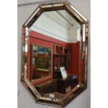 An octagonal wall mirror,