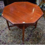 An early 20th century mahogany centre table, octagonal top above a conforming undertier,