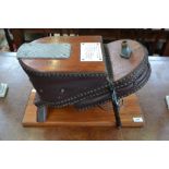 A vintage set of lifeline bellows, studded leather body,