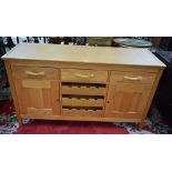 A Marks & Spencer light oak sideboard,