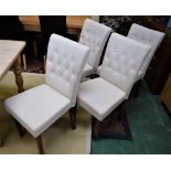A set of four contemporary button back dining chairs (4)