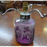 A cameo glass table lamp, amethyst, waterside scene, waterfowl and butterflies,