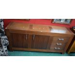 A contemporary teak effect sideboard,