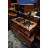 A mid-20th century chest of seven drawers; a similar side table;