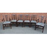 A set of six Chippendale Revival mahogany dining chairs,