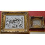 A contemporary resin moulded plaque, in relief with cherubs,