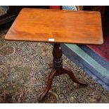 A 19th century mahogany rectangular tilt top table,
