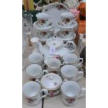 A Continental tea set, for six, printed with Summer Roses, comprising teapot,