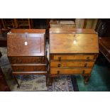 A 20th century 'walnut' bureau, of small proportions,