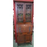 An Arts and Crafts style oak bureau bookcase,