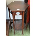 An Arts and Crafts style oak two-tier occasional table,