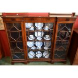 A George III style mahogany inverted break-centre bookcase,