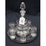 An Art Deco liqueur decanter and set of six tot glasses on tray,