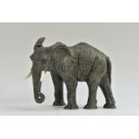 The Matriarch A remarkable carved hardstone sculpture of an African elephant standing alert with