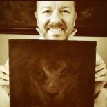 Cats Eyes Painted and very kindly donated by Ricky Gervais, an oil on canvas entitled Lion's Eyes.