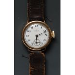 Omega - a vintage 1920s 9ct gold cased wristwatch, white enamel dial, Arabic numerals, minute track,