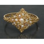 A blister pearl and 15ct gold hinge bangle, naturalistic scrolling crest,