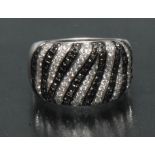 A contemporary certified fancy black and white diamond dress ring,