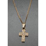 A diamond set cross pendant necklace, inset with eleven round brilliant cut diamond accents,