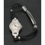 An Art Deco diamond and platinum cocktail watch, textured dial, Arabic numerals, blued hands,