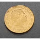 A George III 1820 gold sovereign, 7.
