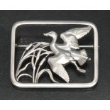 A Georg Jensen sterling silver brooch, designed by Hugo Lissberg,