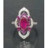 An Art Deco style ruby and diamond ring, central deep red marquise ruby approx 1.