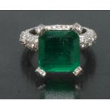 A contemporary certified emerald and diamond ring, central, rectangular emerald cut,