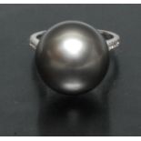 A Tahitian cultured pearl and diamond ring, single metallic greenish grey pearl, approx 16.