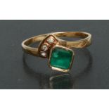 A contemporary design modernist emerald and diamond ring, square cushion cut emerald approx 0.