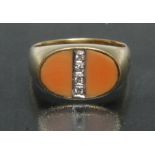 A diamond and pale reddy pink onyx signet ring, central row of four round brilliant cut diamonds,