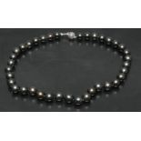 A south sea Tahitian cultured pearl and diamond single strand necklace,