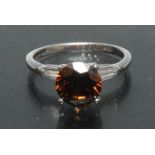 A contemporary certified fancy Cognac diamond ring,